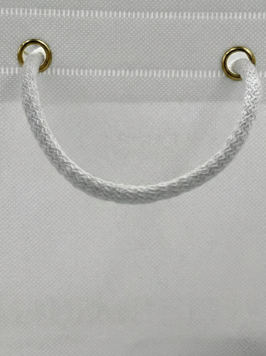 Accessori Premium per Shopper in TNT: Occhielli e Manici in Cotone