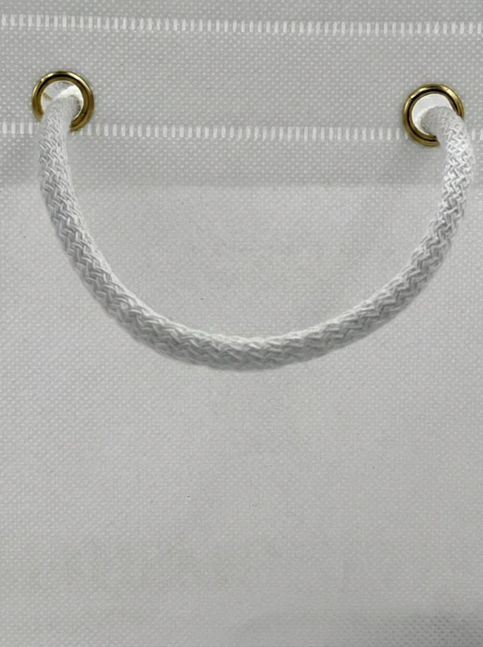 Accessori Premium per Shopper in TNT: Occhielli e Manici in Cotone